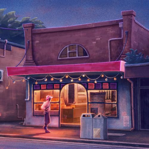 Evening street scene with person outside a lit restaurant