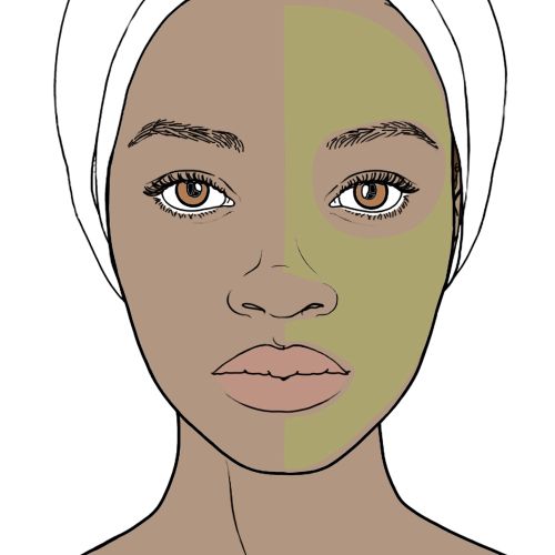 Woman with towel and half green facial mask applied