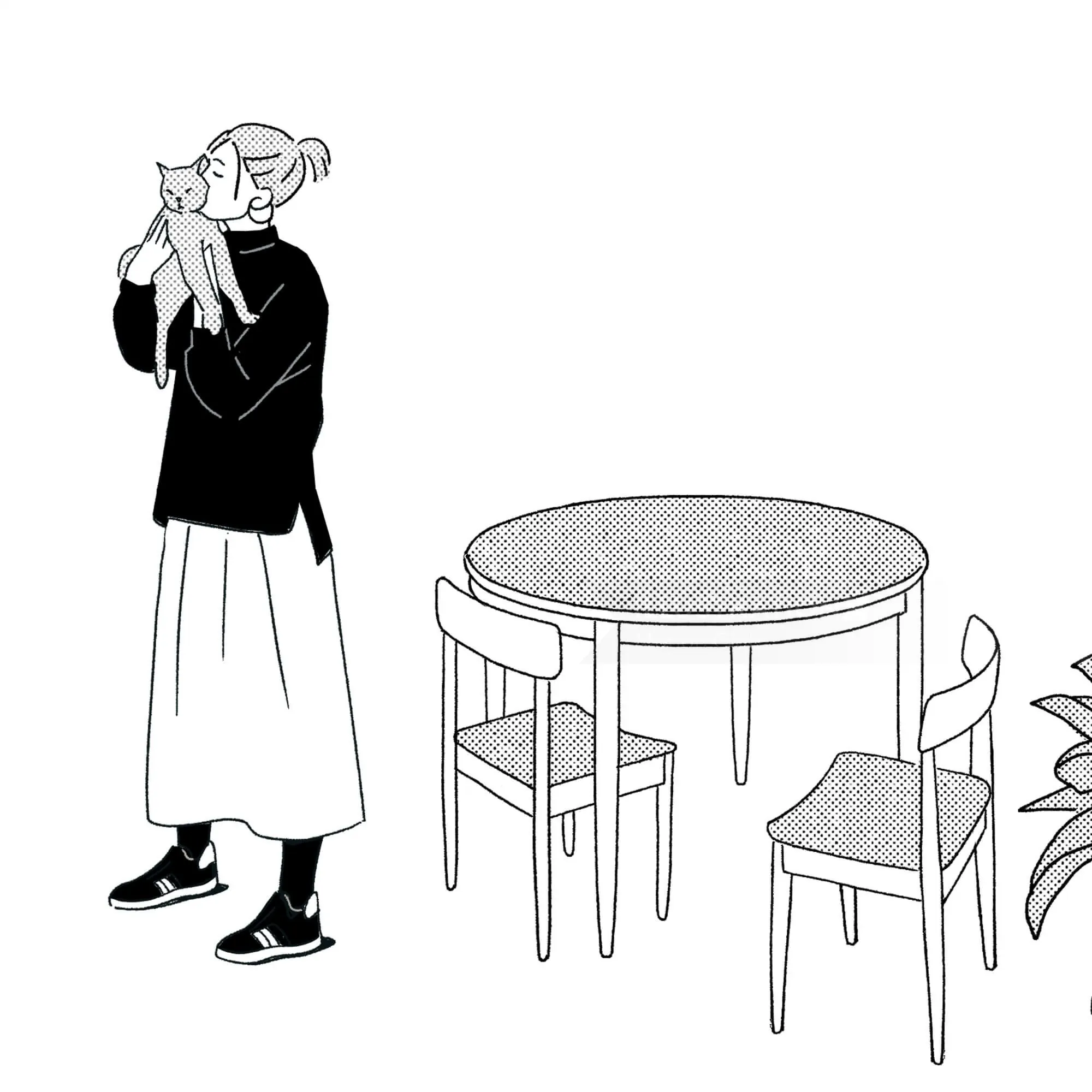 Woman in black sweater holding a cat beside dining table with two chairs