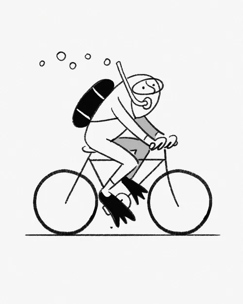 Scuba diver with snorkel riding a bicycle with bubbles
