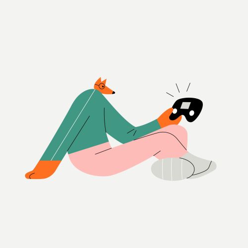 Fox-headed person holding and looking at a game controller