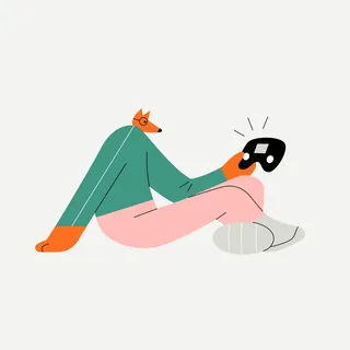 Fox-headed person holding and looking at a game controller
