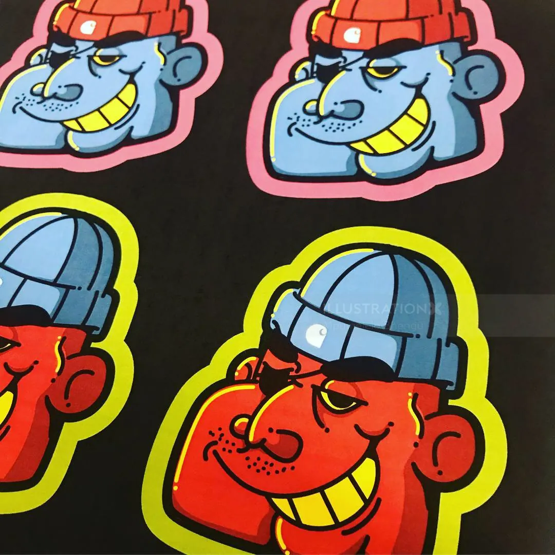 Colorful cartoon stickers with grinning faces wearing hats