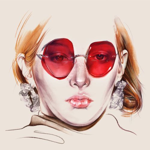 Portrait of a stylish lady with red glasses