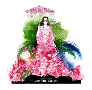 Woman in pink floral dress holding umbrella with tropical leaves background