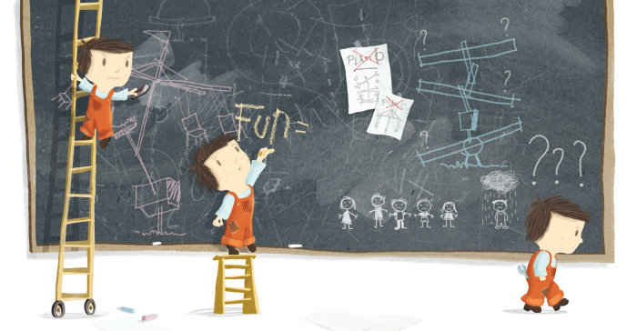 Child writing on blackboard