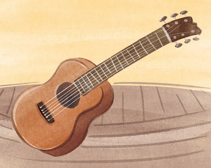 Wooden acoustic guitar resting on a wooden surface by Nathaniel Eckstrom