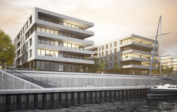Modern waterfront residential buildings with dock and boats by Oliver Hasselluhn
