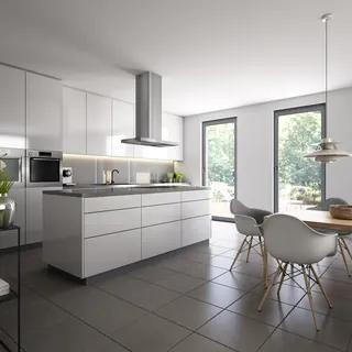 Bright modern kitchen interior with white cabinets and island by Oliver Hasselluhn