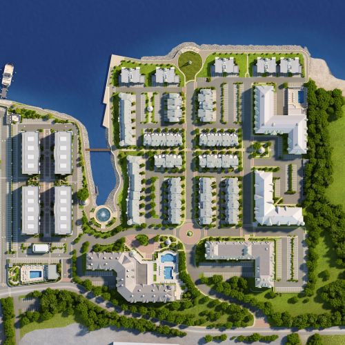 Aerial view of coastal residential complex showing buildings and water, by Oliver Hasselluhn