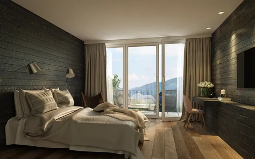 Modern bedroom with bed and mountain view balcony by Oliver Hasselluhn