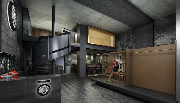 Modern industrial loft interior with spiral staircase and exposed brick by Oliver Hasselluhn