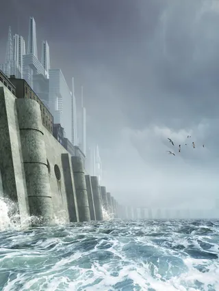 Surreal futuristic city on rocky coast with rough sea and cloudy sky by Oliver Hasselluhn