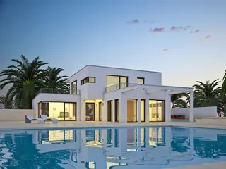 Modern white house with pool and palm trees at sunset
