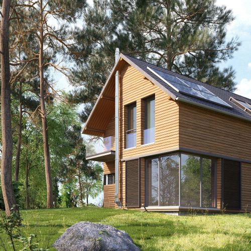 Eco-friendly wooden house with solar panels surrounded by trees