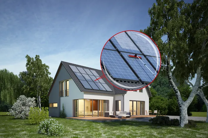 House with solar panels installed on roof in a green yard