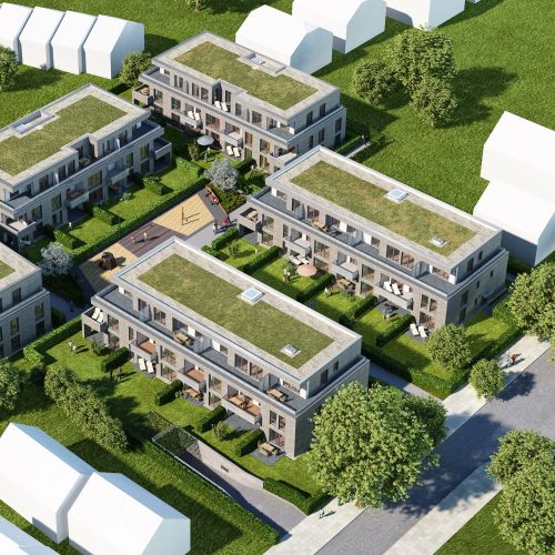 Aerial view of modern residential apartment complex with green roofs and trees