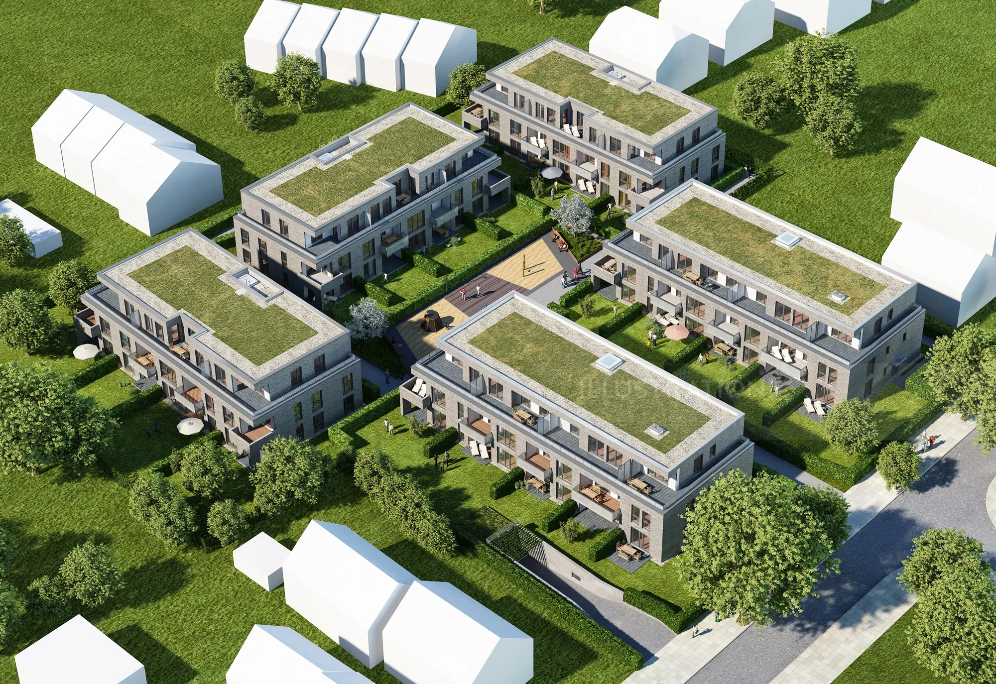 Aerial view of modern residential apartment complex with green roofs and trees
