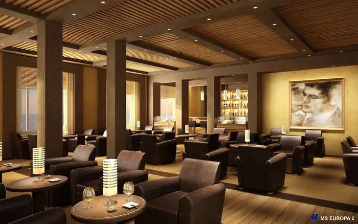 Modern lounge interior with dark armchairs and wooden tables by Oliver Hasselluhn