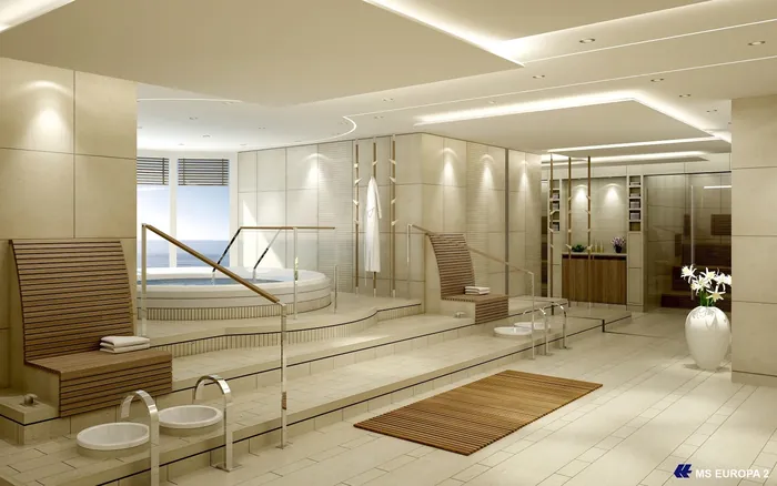 Modern spa interior with hot tub and lounge chairs by Oliver Hasselluhn