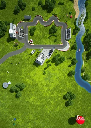 Aerial view of go-kart track and river by Oliver Hasselluhn
