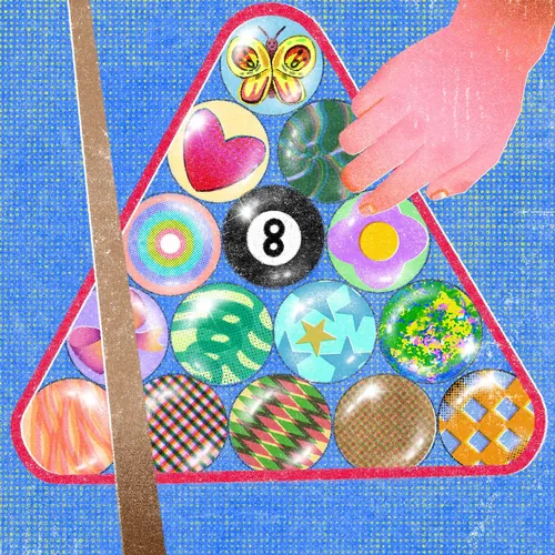 Hand placing colorful pool balls in triangle rack by Oliver Li