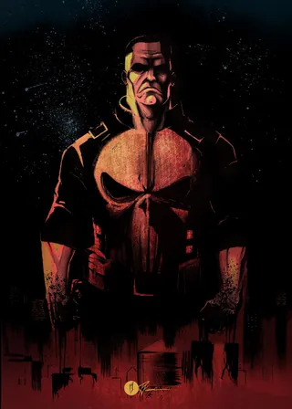 Muscular man with skull emblem standing against dark background