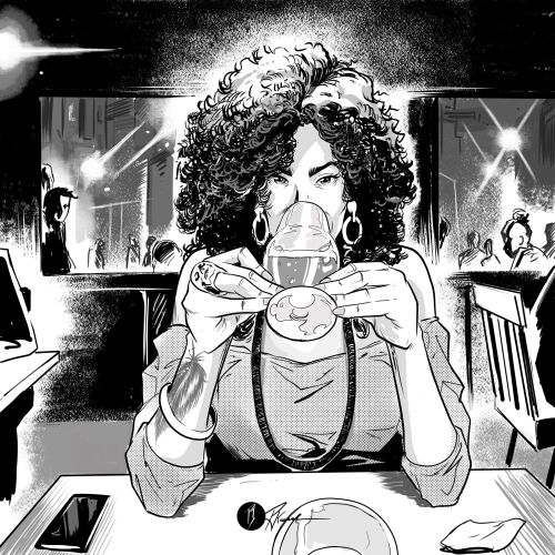 Woman with curly hair drinking from glass in a bar