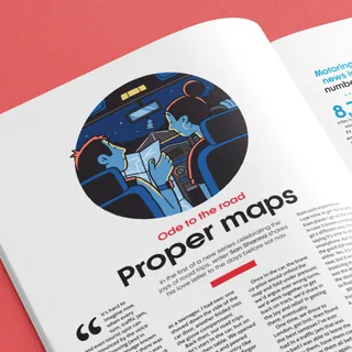 Illustration of two people reading a map inside a car at night