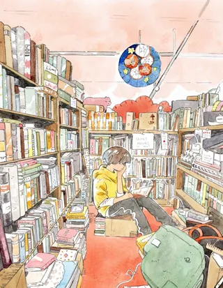 Comfortable reading space with armchair and bookshelf