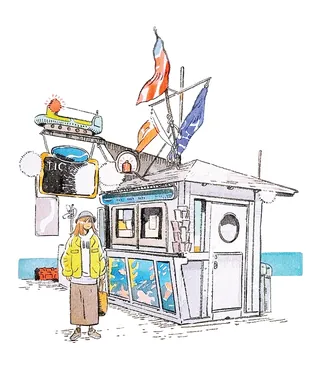 Coastal ticket booth design with portholes and blue trim