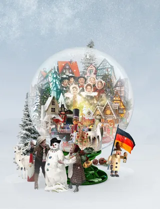 Christmas-themed snow globe with festive village and characters