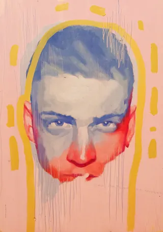 Surreal man's face with blue and red paint on pink background