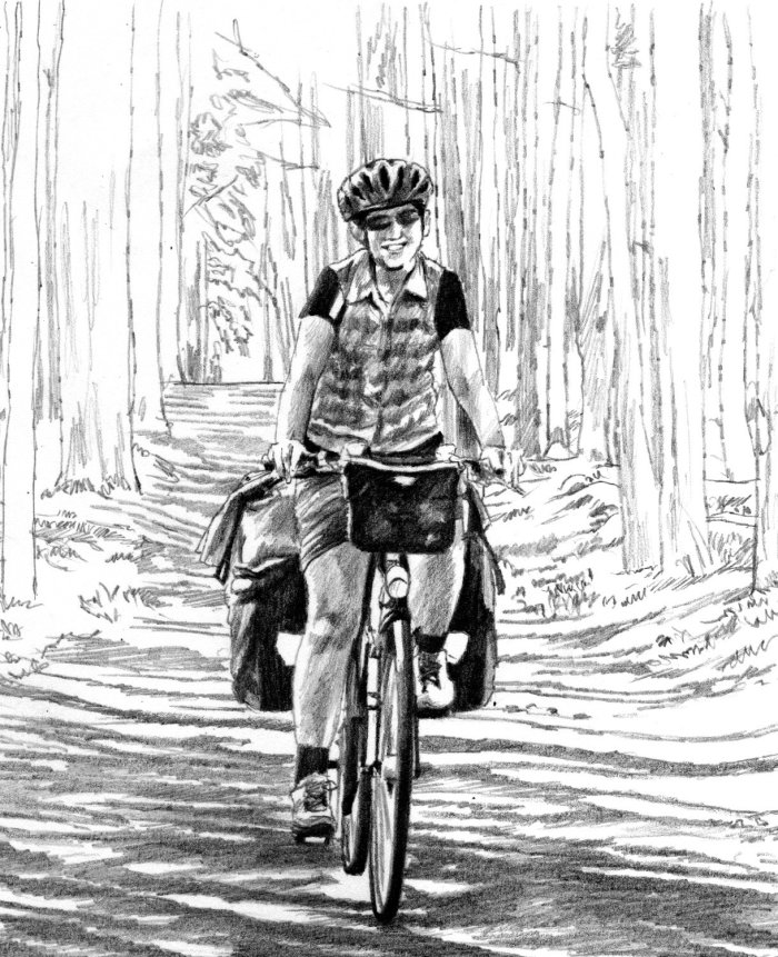 森の中でサイクリングする人々の女性