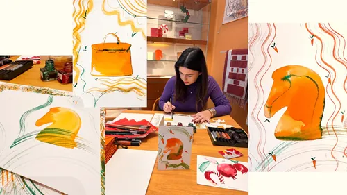 Woman painting colorful hats and boots on paper by Petra Dufkova
