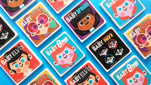 Assorted colorful baby-themed collectible pins with cartoon faces