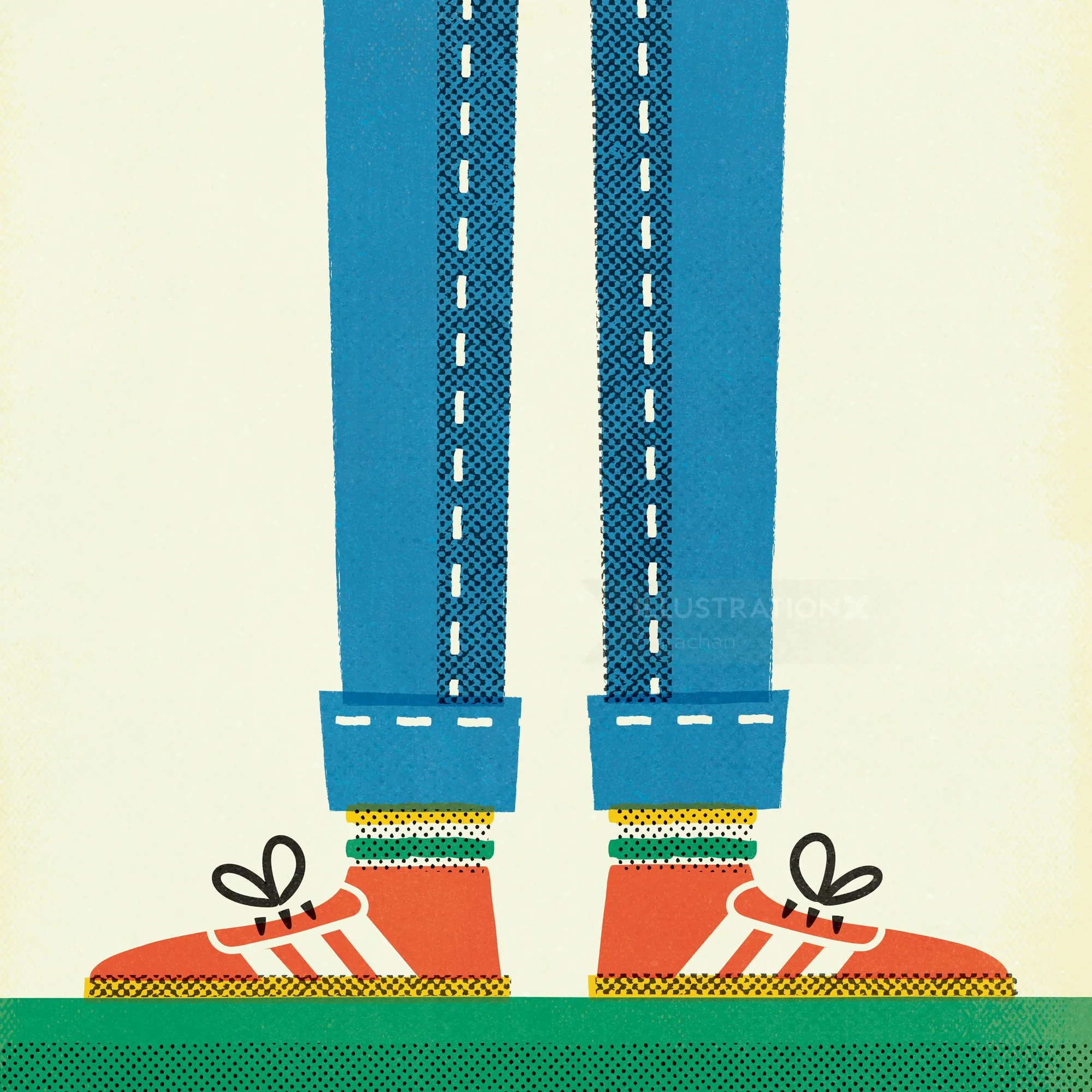Legs in blue jeans and red sneakers with white laces