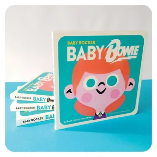 Stack of Baby Rocker books with cartoon character on blue background