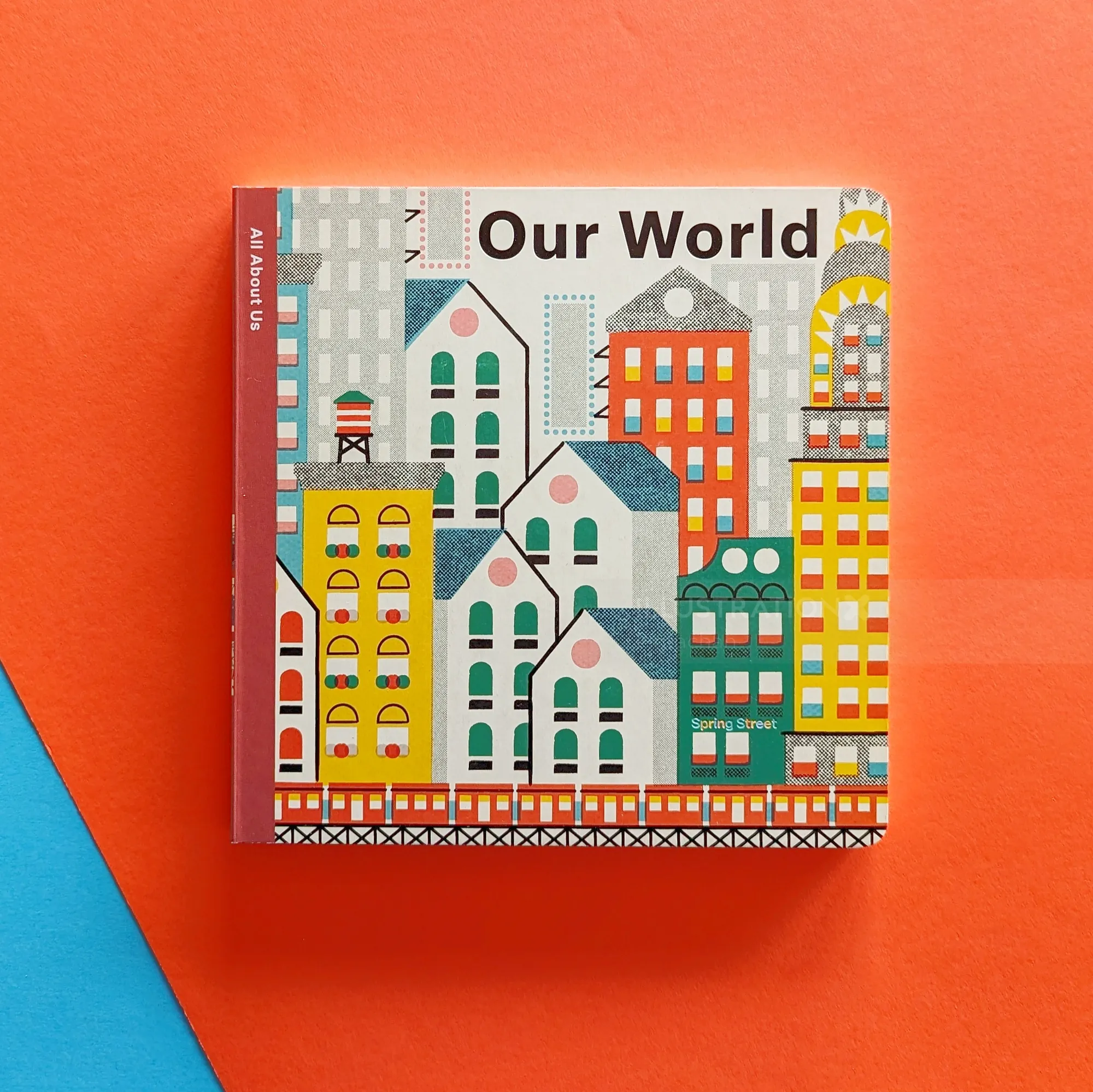 Book cover of Our World with colorful buildings illustration