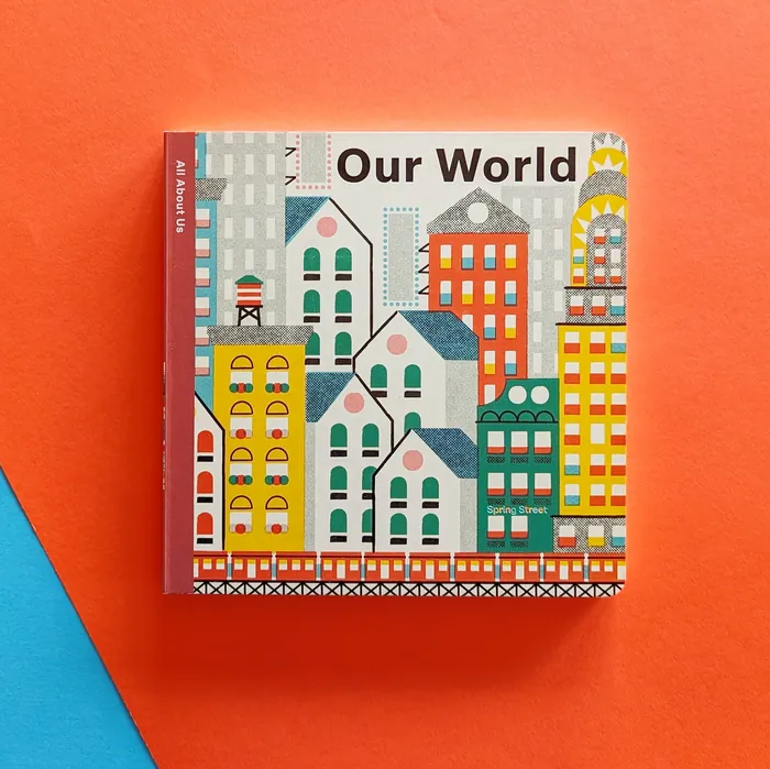 Book cover of Our World with colorful buildings illustration
