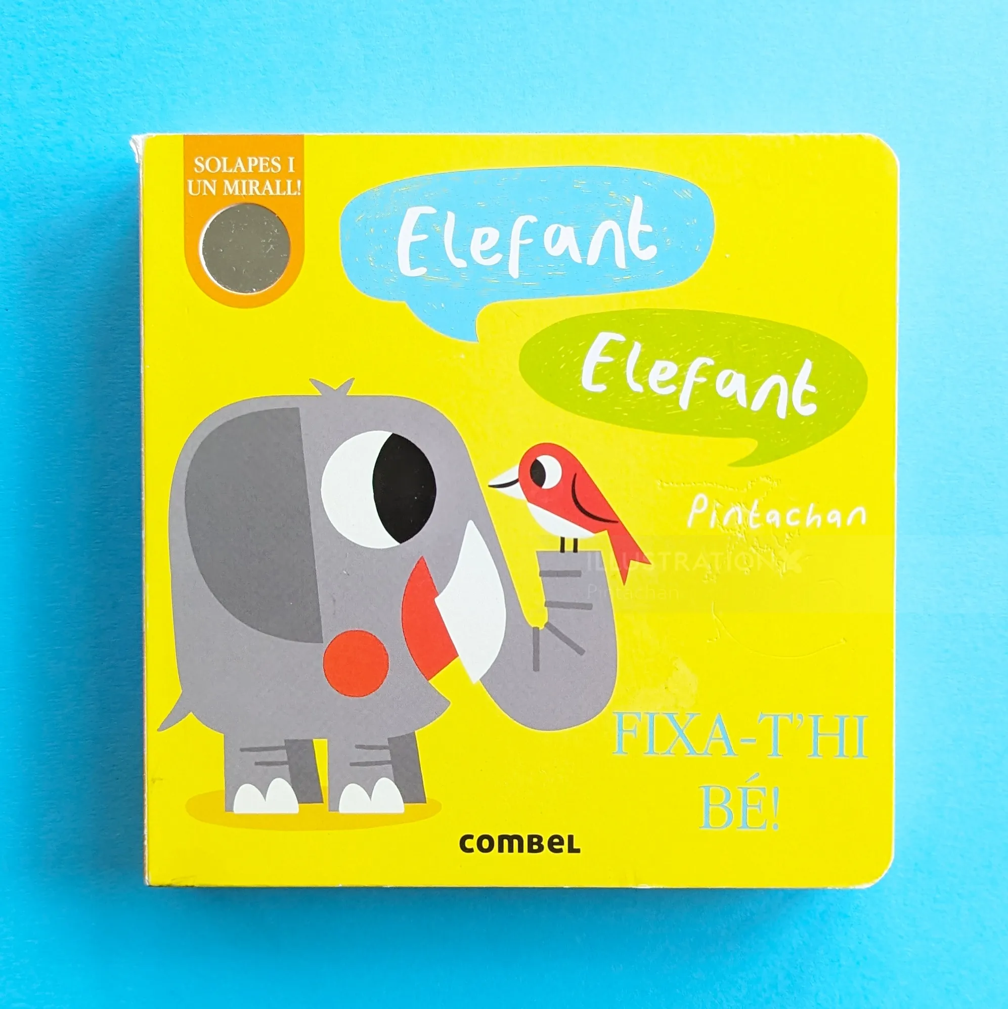Cartoon elephant and red bird on a bright yellow book cover