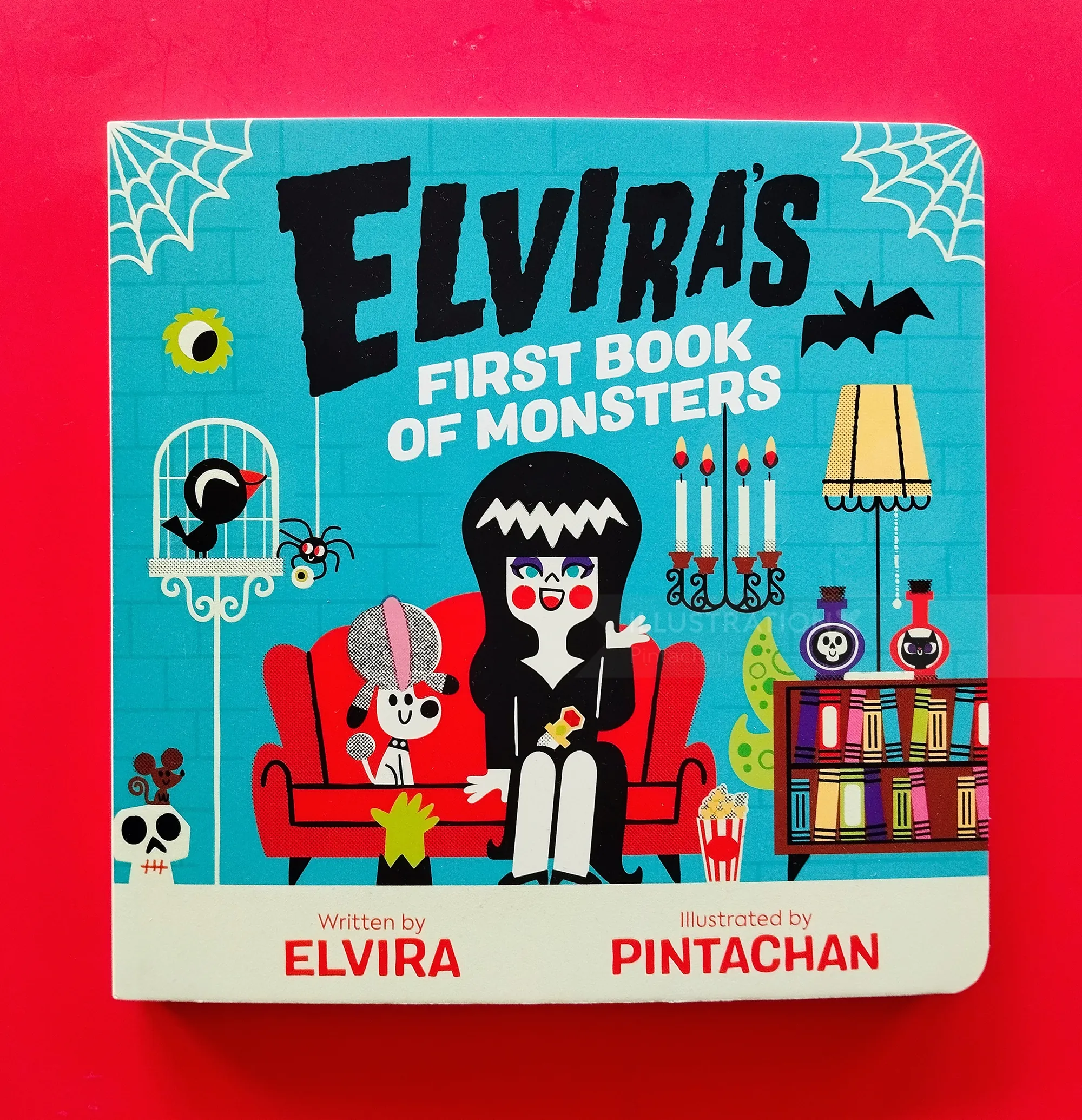 Elvira's First Book of Monsters cover with cartoon Elvira and monsters