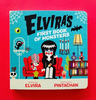 Elvira's First Book of Monsters cover with cartoon Elvira and monsters
