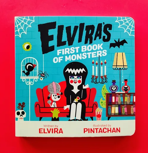 Elvira's First Book of Monsters cover with cartoon Elvira and monsters