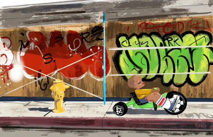 Child riding a toy car near graffiti wall by Quincy Sutton