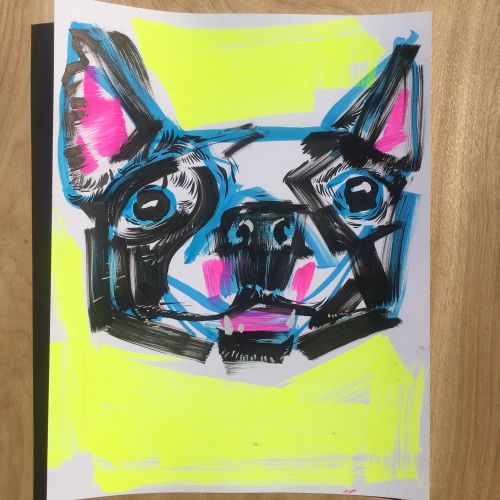 Live event drawing face of a dog

