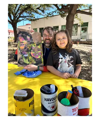 Man and child with live pop art painting outdoors by Quincy Sutton