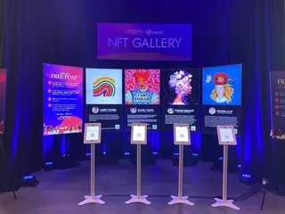 NFT Gallery digital art exhibition with colorful artworks by Rachel Winter