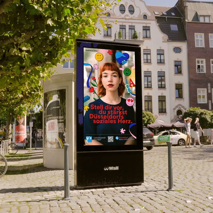 Public poster with a woman's portrait and German text by Rachel Winter