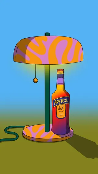 Colorful table lamp with Aperol bottle base and distinctive shade